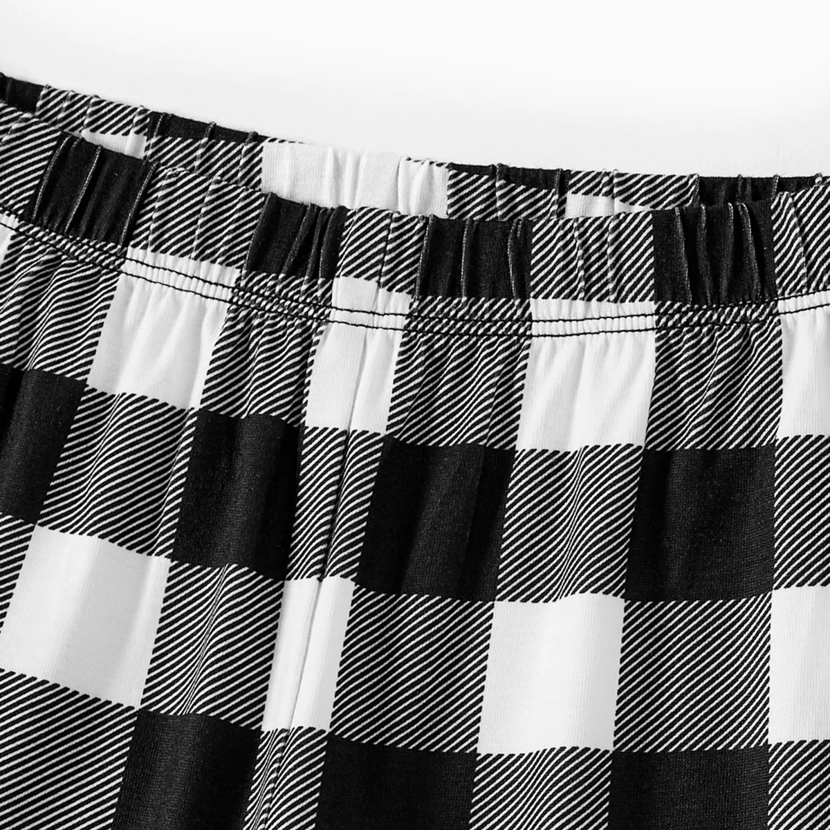 "Family Christmas 2025" Text and Deer Prints Black Long Sleeve Top with Black And White Plaid Pants Family Matching Pajamas