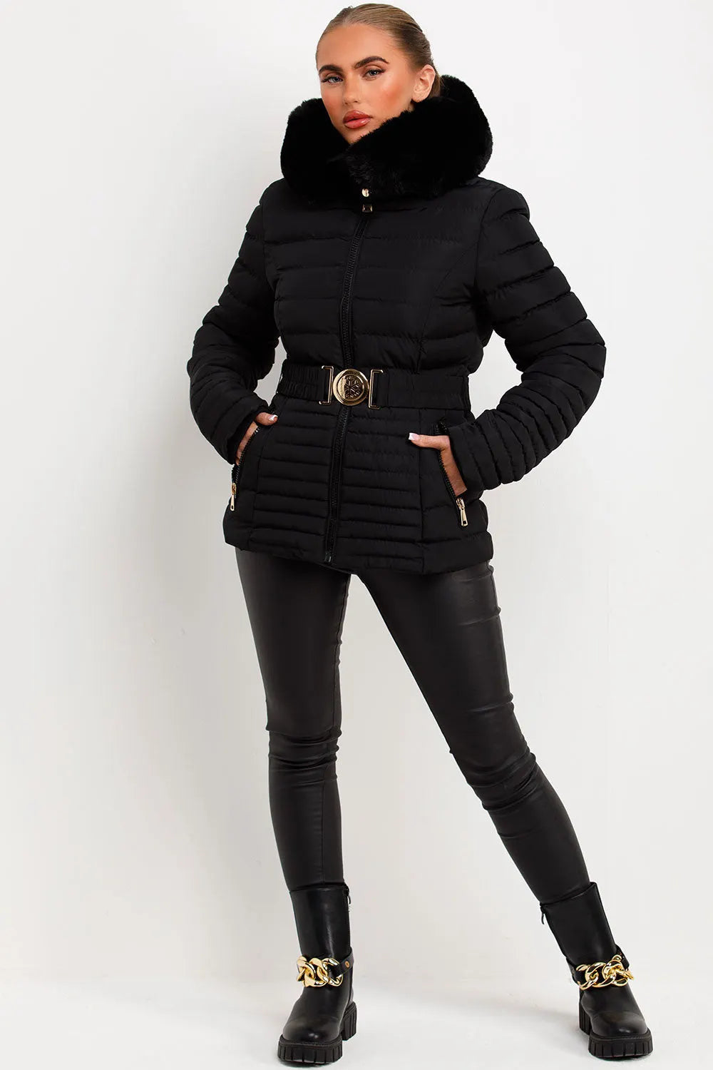 Black Puffer Jacket With Faux Fur Hood And Gold Belt