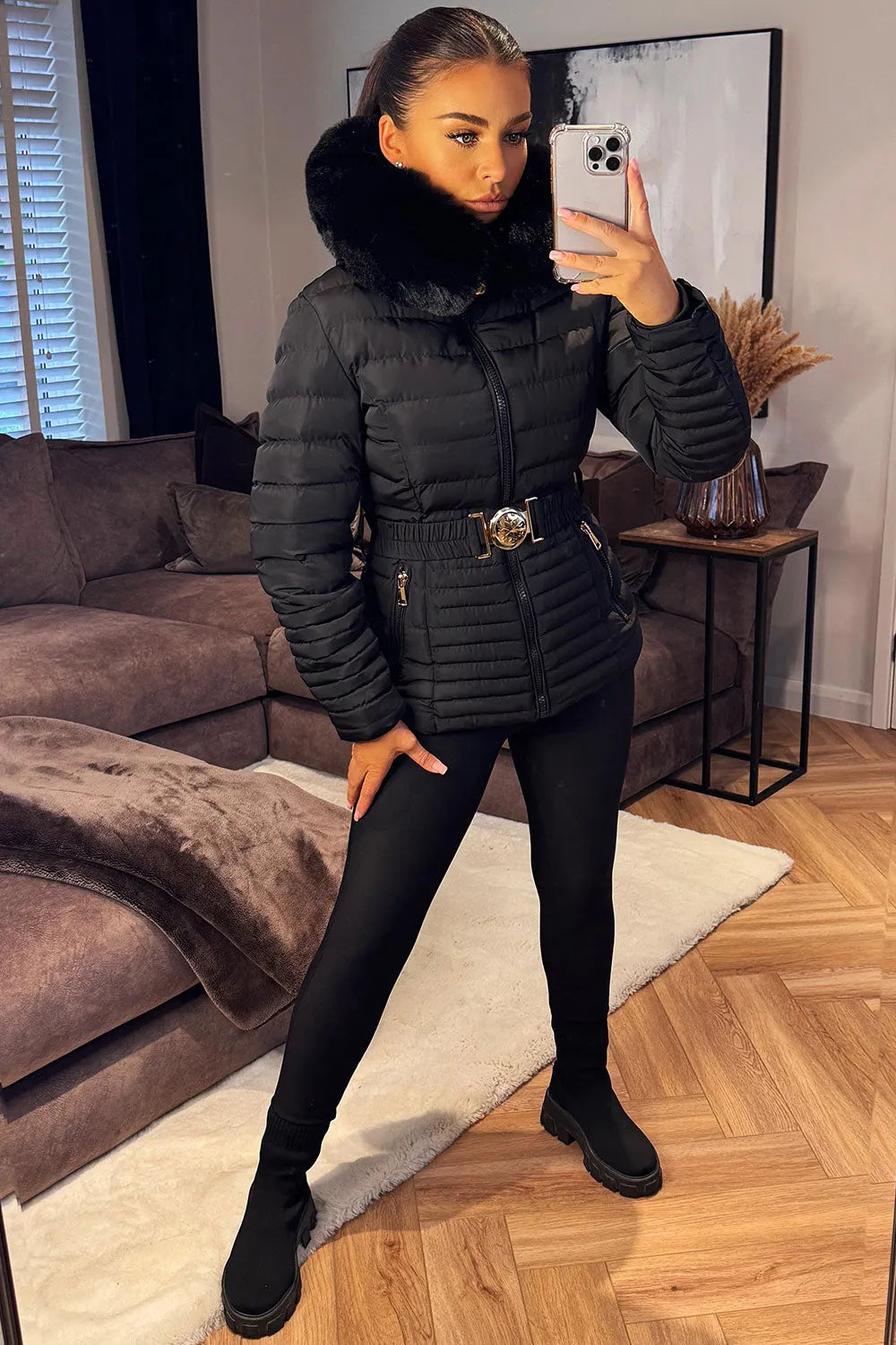 Black Puffer Jacket With Faux Fur Hood And Gold Belt