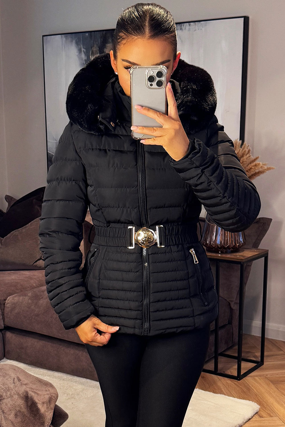 Black Puffer Jacket With Faux Fur Hood And Gold Belt