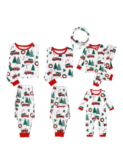 Superb white pajamas with Christmas trees red trucks motifs for all the family