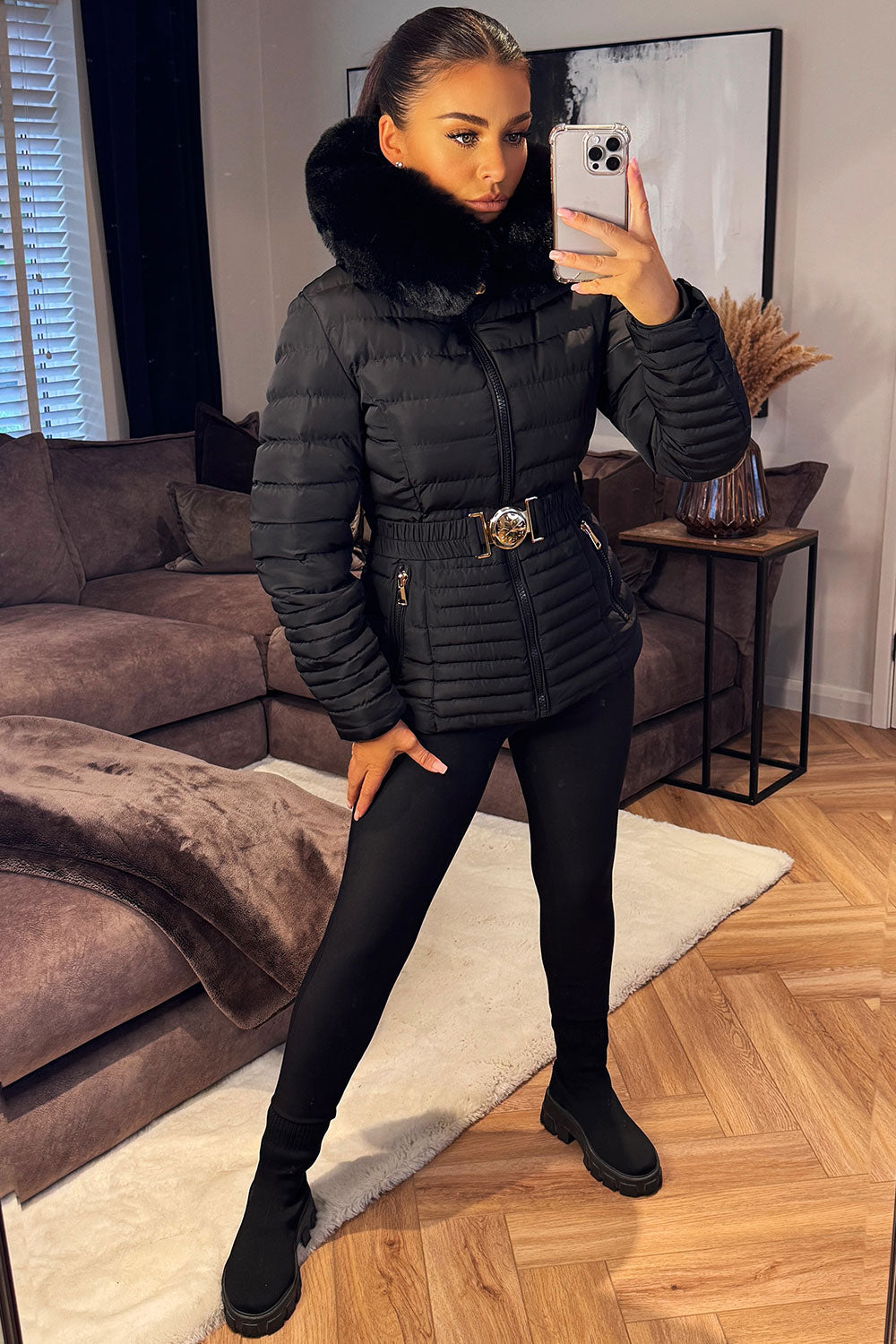 Black Puffer Jacket With Faux Fur Hood And Gold Belt